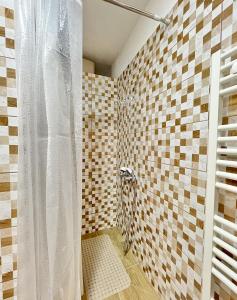 a bathroom with a shower with a white shower curtain at Green Village Life in Katun +16 photos