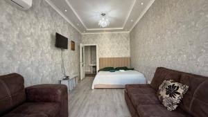 Postel nebo postele na pokoji v ubytování 2-room apartment Tynystanova 94 + 11 fotografií
