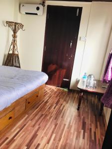 Postelja oz. postelje v sobi nastanitve Mita Hotel-Resort Marga