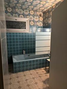 Koupelna v ubytování TANT-GUO Bella home + 6 fotografií