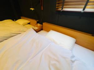 Letto o letti in una camera di SIMA inn