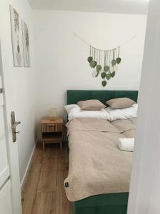 Postel nebo postele na pokoji v ubytování Apartament Przy Fosie