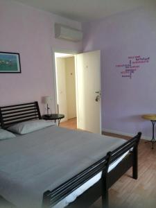 Postel nebo postele na pokoji v ubytování B&B Topaze