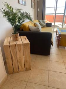A seating area at Apartamento Mi casa tu casa