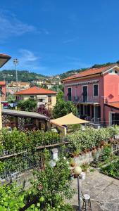 a view of a city with buildings and trees at Maison 18 in La Spezia