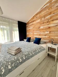 Postel nebo postele na pokoji v ubytování Sävsjöns Boende