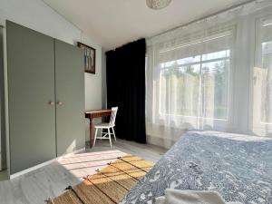 Postel nebo postele na pokoji v ubytování Sävsjöns Boende