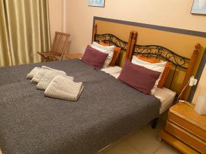 A bed or beds in a room at Apartamento Mi casa tu casa Még 26 kép