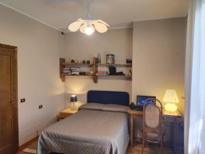 Postel nebo postele na pokoji v ubytování B&B Paolo e Francesca