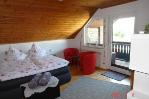 Katil atau katil-katil dalam bilik di Ferienwohnung in Sponsheim