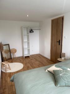 Giường trong phòng chung tại Le Gîte Du Malt