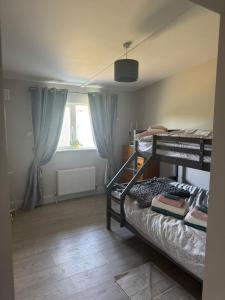 Ένα ή περισσότερα κρεβάτια σε δωμάτιο στο GL farm and stables guest house