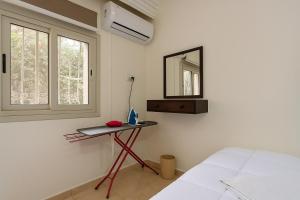 Ένα ή περισσότερα κρεβάτια σε δωμάτιο στο 820 · 2BR Townhouse Bath TV Backyard