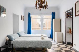 Posteľ alebo postele v izbe v ubytovaní Vintage Flat Malaga
