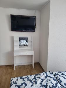 TV a/nebo společenská místnost v ubytování Apartmani D&D