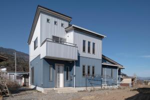 a house with a blue and white at 3LDK MAX12名 富士山が見える一棟貸 スタイリッシュデザイン Villa Sena in Nishikatsuracho