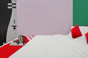 Postel nebo postele na pokoji v ubytování Hotel O Padam Residency