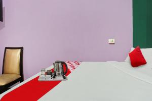 Postel nebo postele na pokoji v ubytování Hotel O Padam Residency