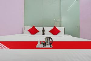 Postel nebo postele na pokoji v ubytování Hotel O Padam Residency
