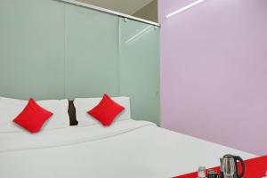 Postel nebo postele na pokoji v ubytování Hotel O Padam Residency
