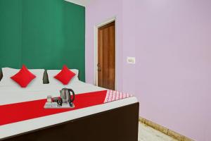 Postel nebo postele na pokoji v ubytování Hotel O Padam Residency