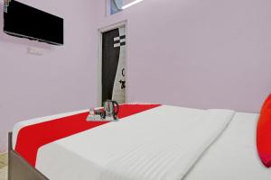 Postel nebo postele na pokoji v ubytování Hotel O Padam Residency