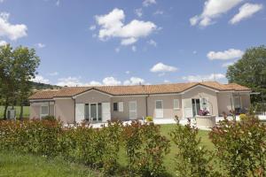 a house with a garden in front of it at La casa nel verde in Recanati