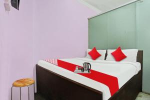 Postel nebo postele na pokoji v ubytování Hotel O Padam Residency