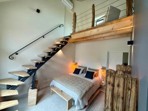Postel nebo postele na pokoji v ubytování Au Détour des Châteaux