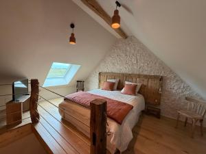 Postel nebo postele na pokoji v ubytování Au Détour des Châteaux + 37 fotografií