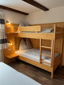 A bed or beds in a room at Appartement Höll