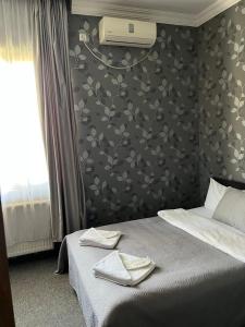 Ένα ή περισσότερα κρεβάτια σε δωμάτιο στο Hotel Eight