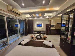 Η κουζίνα ή μικρή κουζίνα στο Siddha Xanadu Studio Apartment # 334 Kolkata