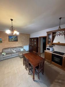 a living room with a table and a couch at Da Lisa in Ortona