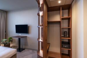 TV a/nebo společenská místnost v ubytování Hotel De Zeevaartschool