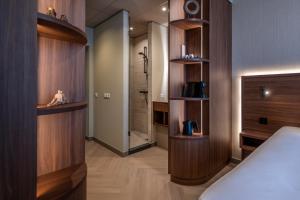 Postel nebo postele na pokoji v ubytování Hotel De Zeevaartschool