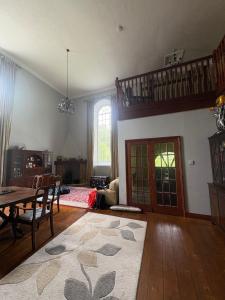 a living room with a table and a dining room at Chapel House in Saint Cleer +49 photos