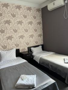 Ένα ή περισσότερα κρεβάτια σε δωμάτιο στο Hotel Eight