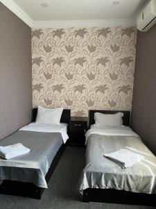 Ένα ή περισσότερα κρεβάτια σε δωμάτιο στο Hotel Eight