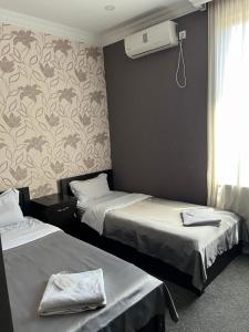 Ένα ή περισσότερα κρεβάτια σε δωμάτιο στο Hotel Eight