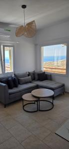 Posedenie v ubytovaní Mykonian Tramonti Villas