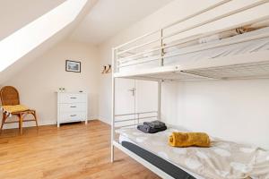 Postel nebo postele na pokoji v ubytování Gîte du Dolmen