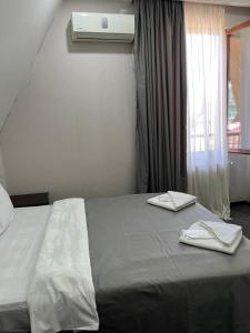 Ένα ή περισσότερα κρεβάτια σε δωμάτιο στο Hotel Eight
