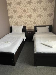 Ένα ή περισσότερα κρεβάτια σε δωμάτιο στο Hotel Eight