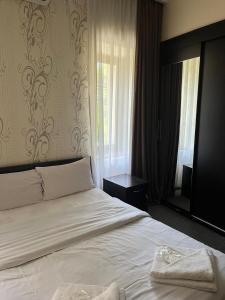 Ένα ή περισσότερα κρεβάτια σε δωμάτιο στο Hotel Eight