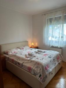 Postel nebo postele na pokoji v ubytování One Love 2