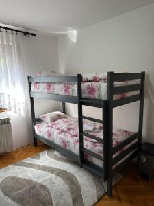 Postel nebo postele na pokoji v ubytování One Love 2
