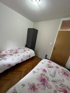 Postel nebo postele na pokoji v ubytování One Love 2