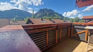 a balcony with a view of the mountains at Ferienwohnungen Wolf - Wohnung "Breitenberg" 2,5 Zimmer mit Bergblick in Pfronten