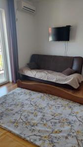 Postel nebo postele na pokoji v ubytování Vesna apartmani, Igalo